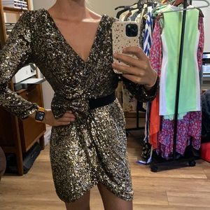 Sequin dress with bow detail and open back